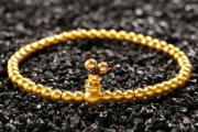 中年人适合戴的黄金手链，珠圆玉润的黄金光面珠子手链